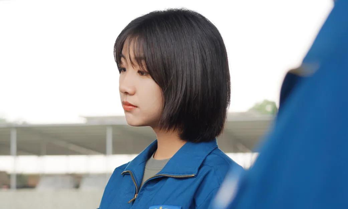 PLA Western Theater Command on Thursday, the 77th Group Army has welcomed two fresh graduated female helicopter pilots Han Jianing and Chen Tianchang in the team, where their pictures in pilots suits are also published. Photo: Web