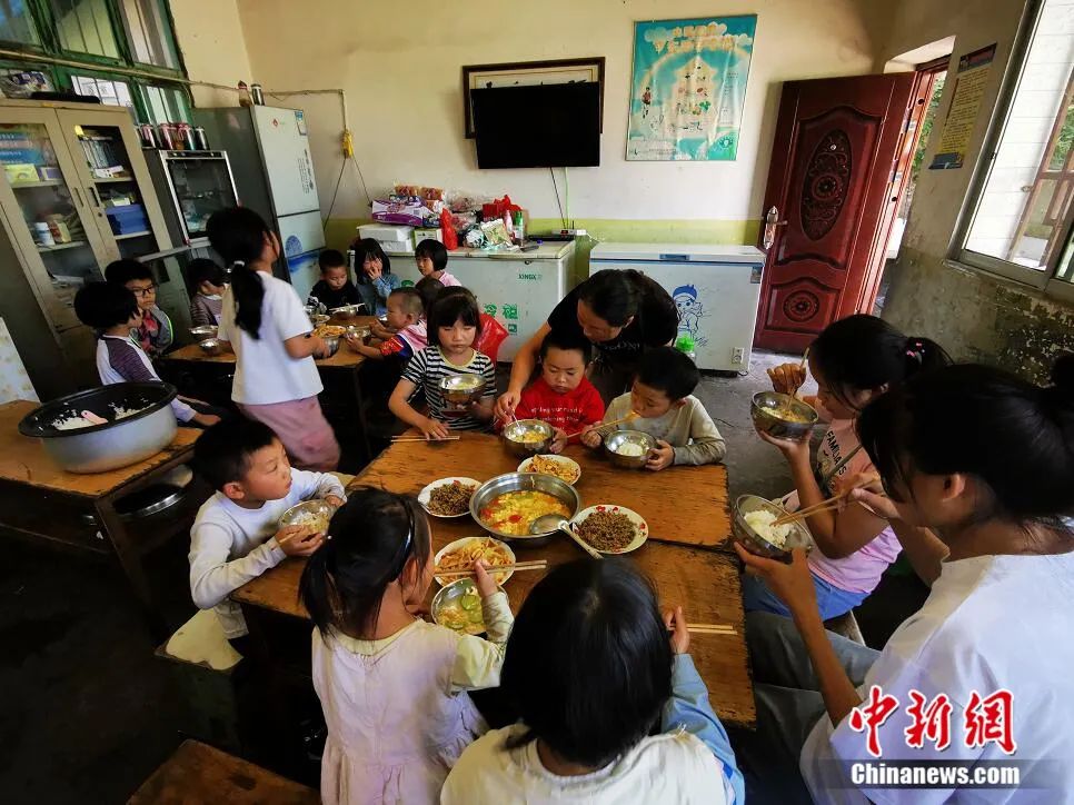 Devoted Chinese village teachers double up as parents for students